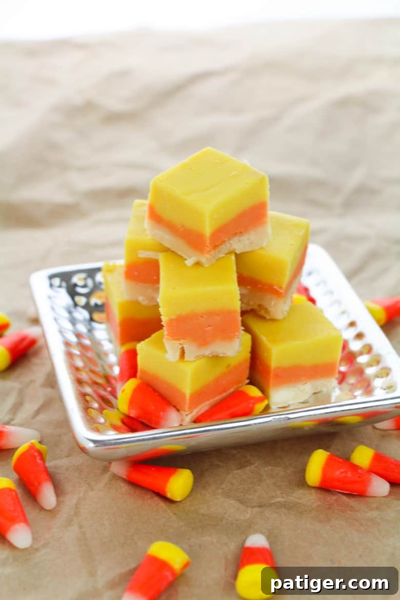 Festive Candy Corn Fudge 2 Yellow, orange, and white layered fudge