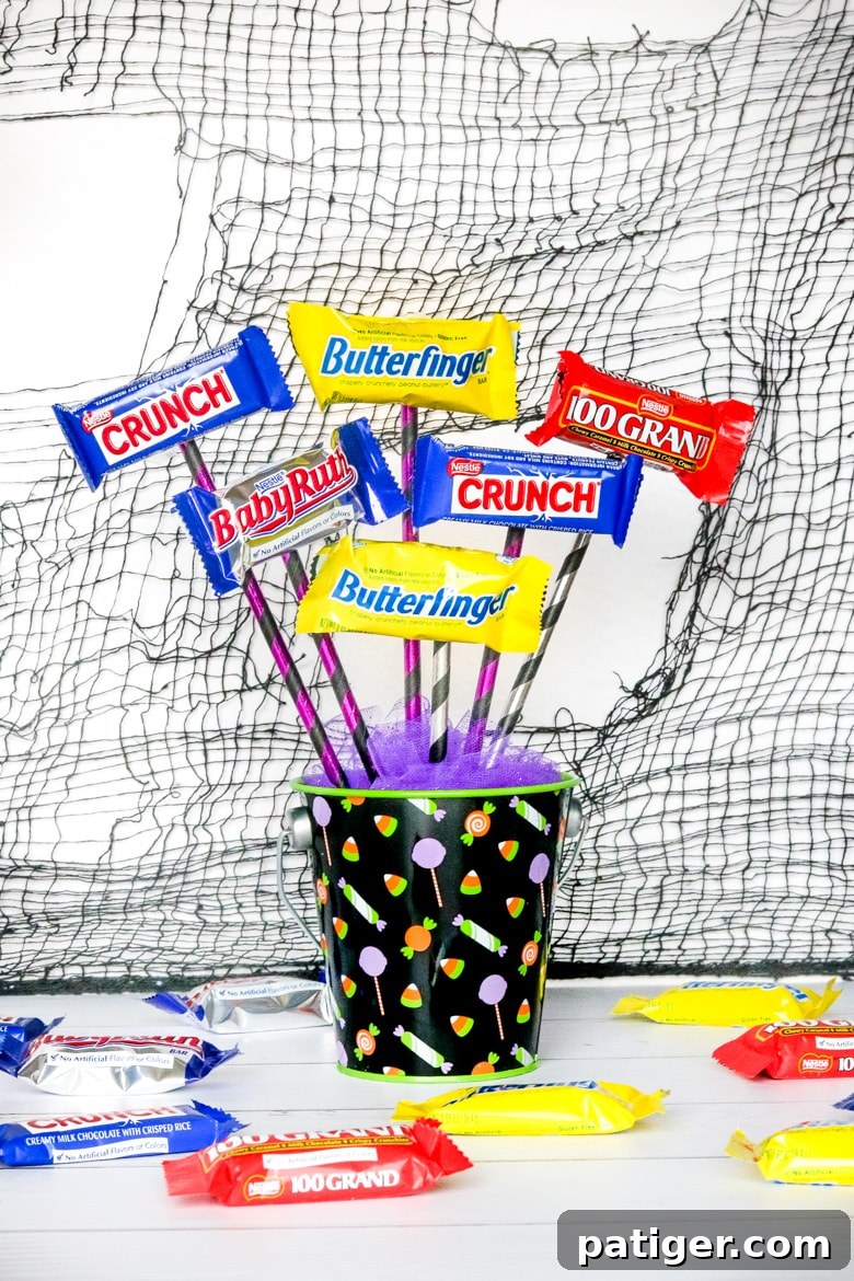 Small Candy Bouquet Idea for Halloween featuring Fun Size Butterfinger, Crunch, 100 Grand, and Baby Ruth