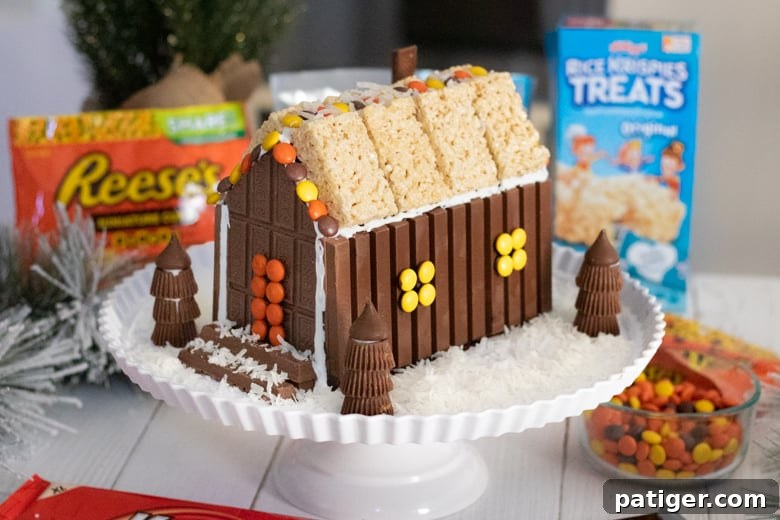 Festive Sweet Retreat 7 Candy Cabin with Snowy Ground around the base made of shredded coconut.