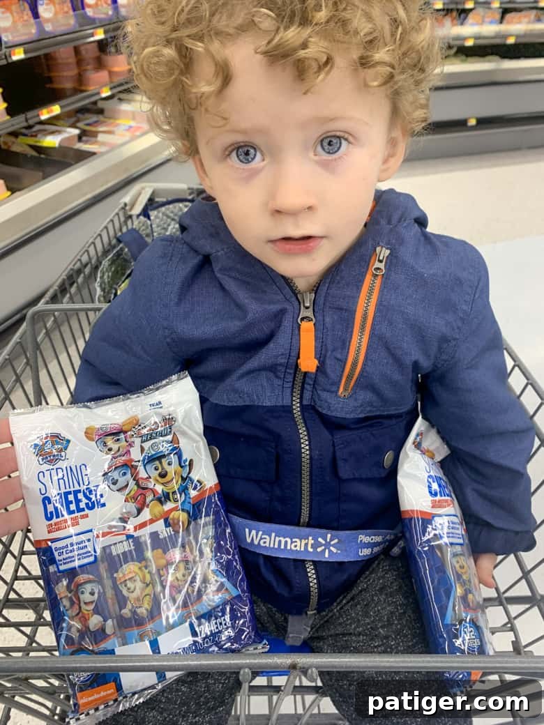 PAW Patrol String Cheese displayed in the cheese section at Walmart.