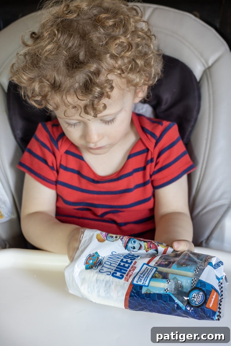 Close-up of PAW Patrol Cheese sticks, highlighting individual packaging.