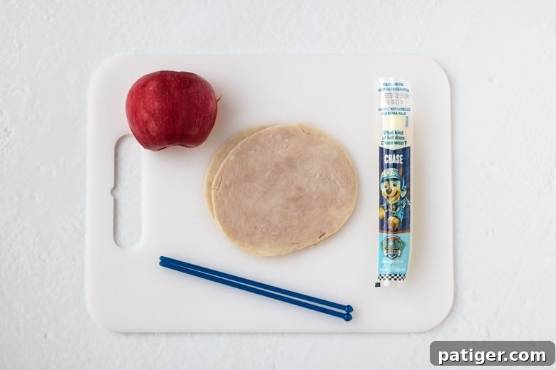 Ingredients laid out for Turkey Apple Cheese Kabobs.