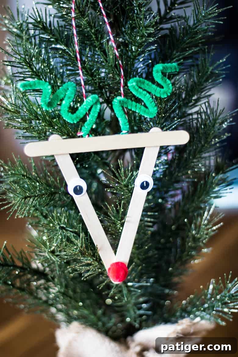 Whimsical Craft Stick Reindeer Decor 3 Rudolph reindeer ornament craft with popsicle sticks ready to be adorned