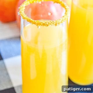 apple cider mimosas sitting on a table