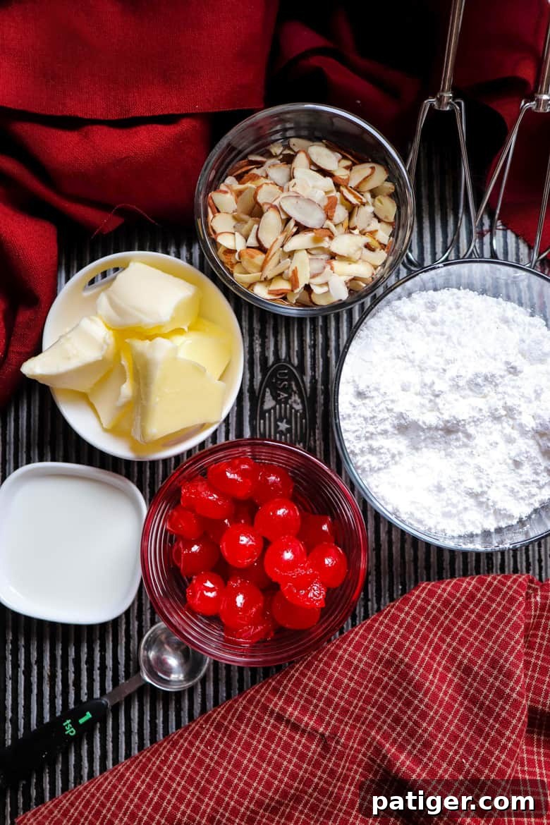 Ingredients for the luscious buttercream frosting and delightful toppings: butter, cherries, slivered almonds, powdered sugar, and milk.