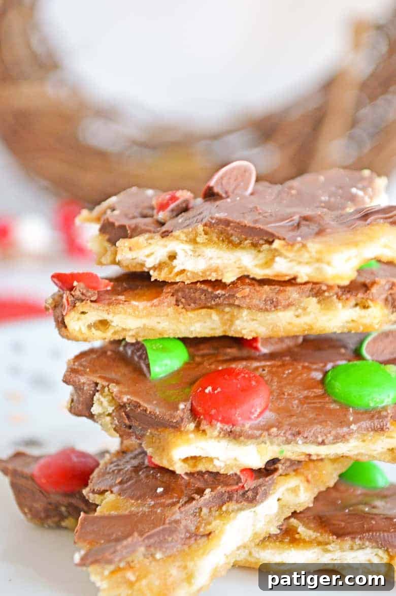 closeup of Christmas crack candy with red and green M&M's