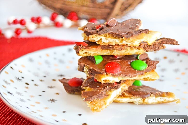 plated Christmas crack candy with festive sprinkles