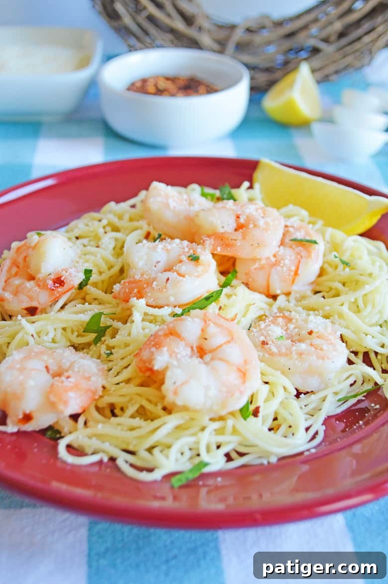 Close-up of garlic shrimp scampi pasta with juicy shrimp and rich sauce.