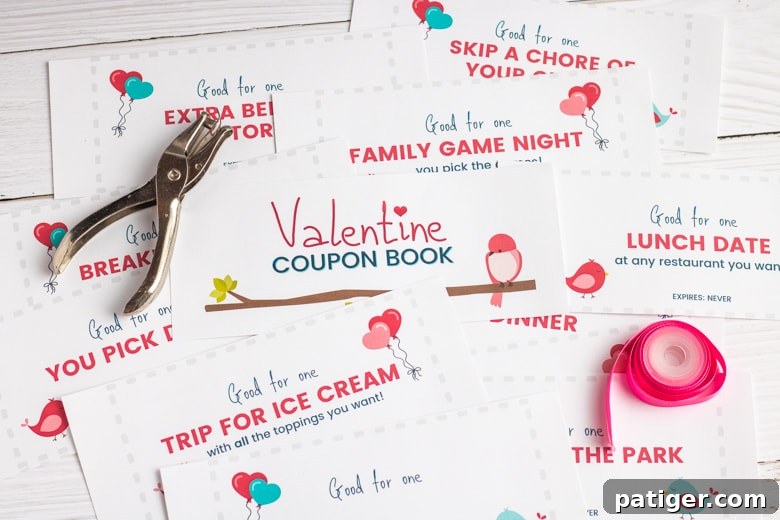 A close-up of a child's hand holding a single Valentine's Day coupon that says 'Good for one Trip for Ice Cream', highlighting the fun and tangible nature of the gift.