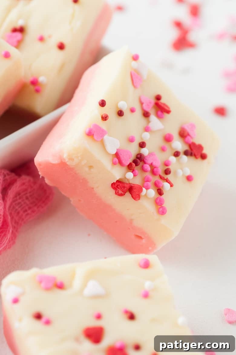 Velvet Valentine Fudge 3 White Chocolate Valentine Fudge topped with small heart sprinkles.