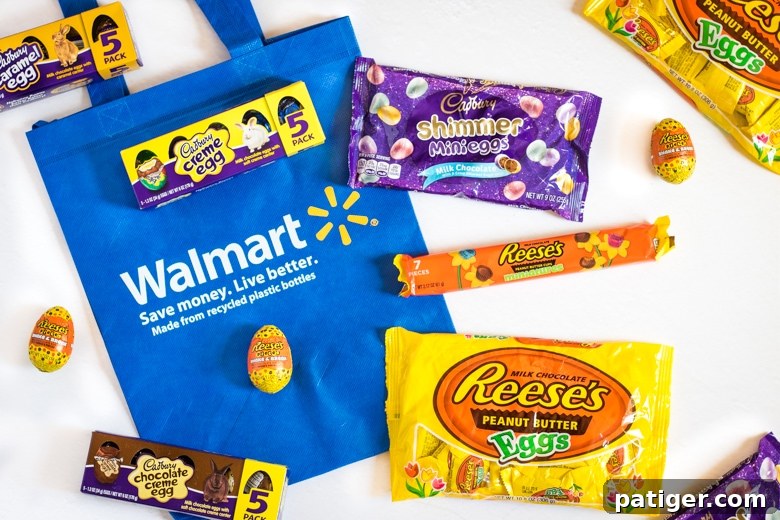 A colorful selection of Easter candies from Walmart, including REESE’S Eggs, Cadbury Creme Eggs, REESE’S Shake & Break Eggs, and Cadbury Shimmer Mini Eggs, ready for cake decoration.