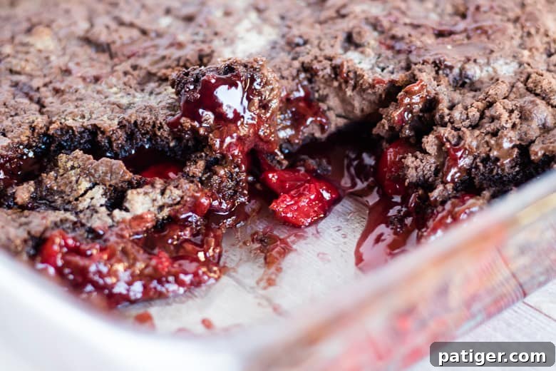 Velvet Cherry Chocolate Bake 2 3 Ingredient cake with cherry pie filling and devil's food cake mix made in a 9 x 13 pan.