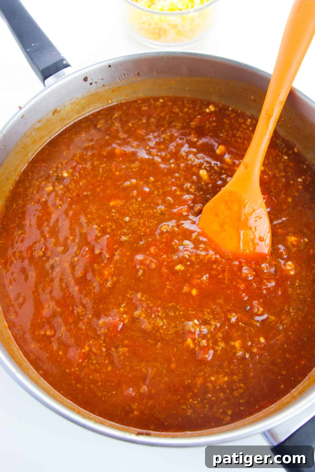 skillet filled with beefy red sauce