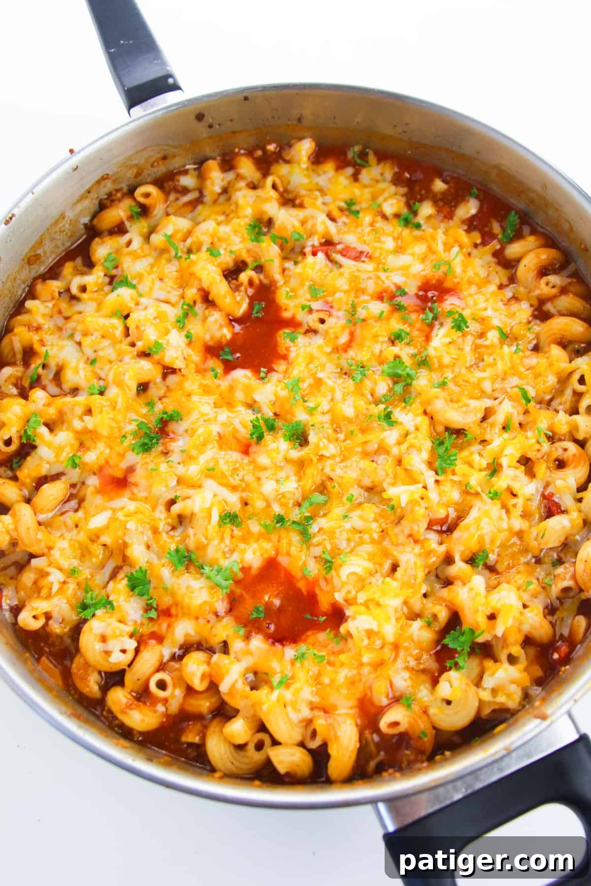 overhead image of skillet of enchilada pasta
