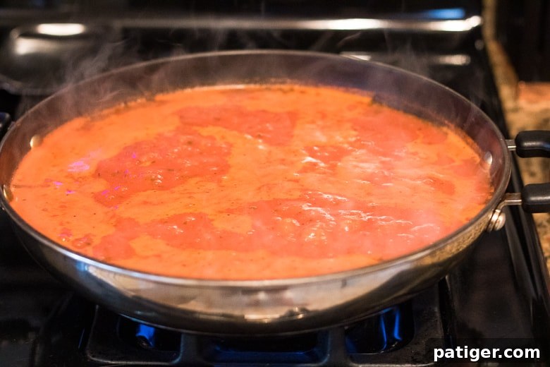 Simple Suppers: 3 Weeknight Wins 5 Prego Sauce and Water in Pan