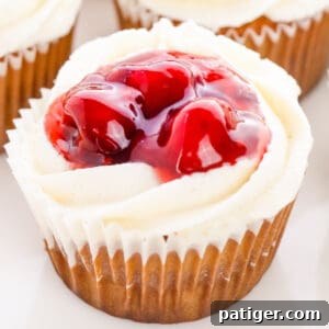 Cherry Pie Cupcakes with buttercream frosting and cherry pie filling