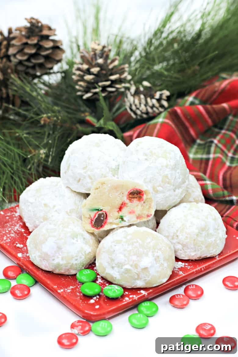Yuletide Melting Moments 2 Holiday Snowball Cookies with vibrant red and green M&Ms