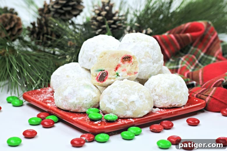 Yuletide Melting Moments 3 Snowball cookies filled with red and green M&Ms