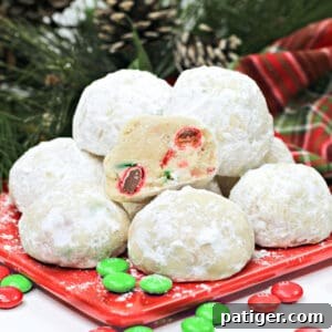 Christmas Snowball Cookies with red and green M&Ms