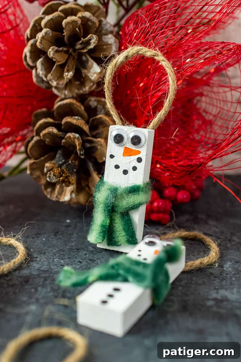 Charming Wooden Block Snowmen 2 DIY Snowman Ornament crafted from wood blocks with a tiny scarf