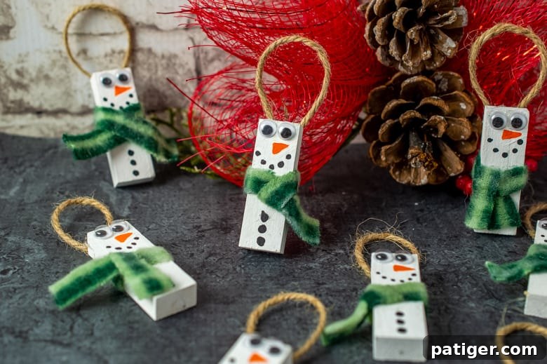 Charming Wooden Block Snowmen 3 Dollar Tree Snowman Ornaments displayed together on a wooden surface