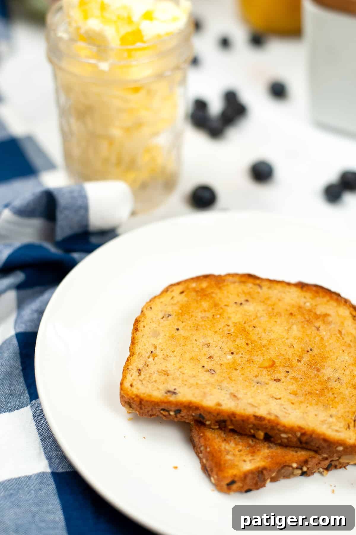toast with homemade butter in jar in background