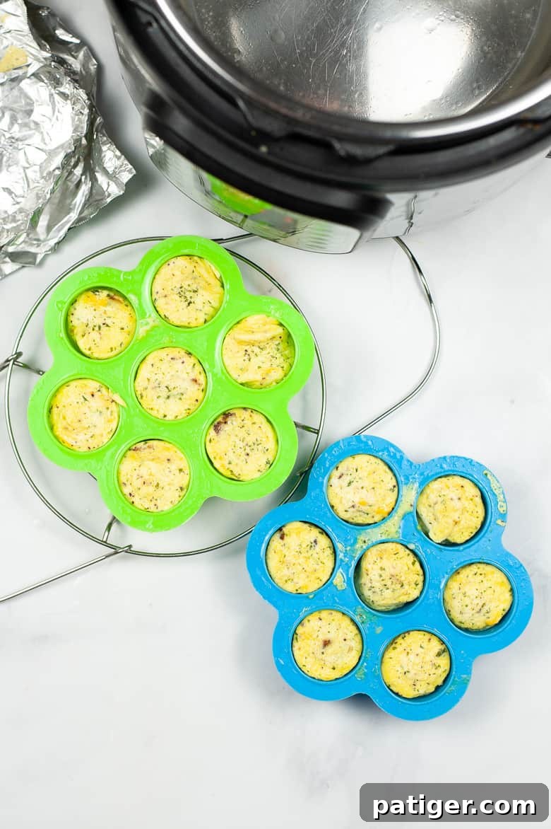 Egg bites in silicone molds next to Instant Pot