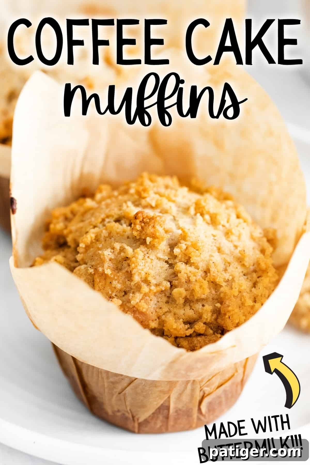 A beautifully crumb-topped coffee cake muffin in a paper wrapper, with text overlay 'Coffee Cake Muffins made with Buttermilk'.