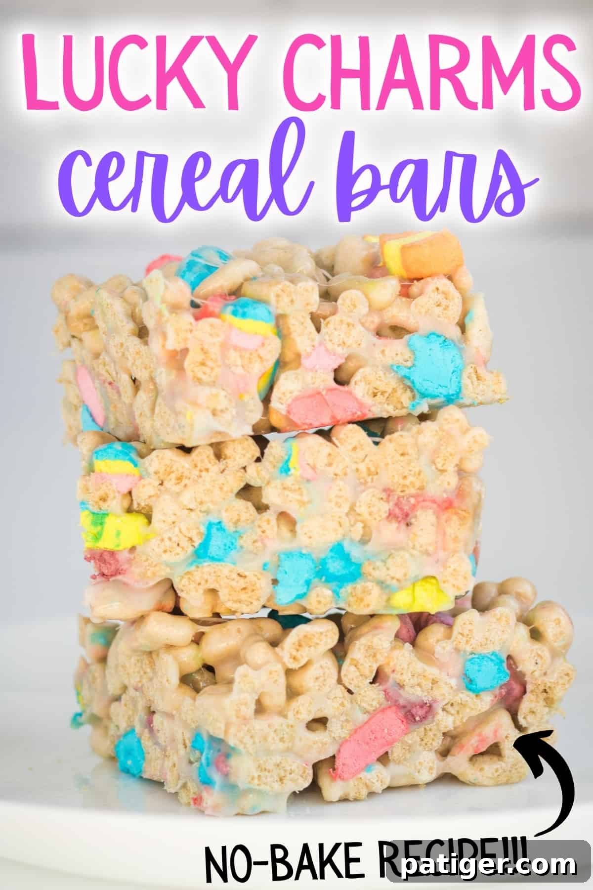 Magical Lucky Charms Treats 10 Three lucky charms marshmallow cereal bars cut into squares and stacked on top of one another on a white plate. Reads: Lucky Charms Cereal Bars; no-bake recipe