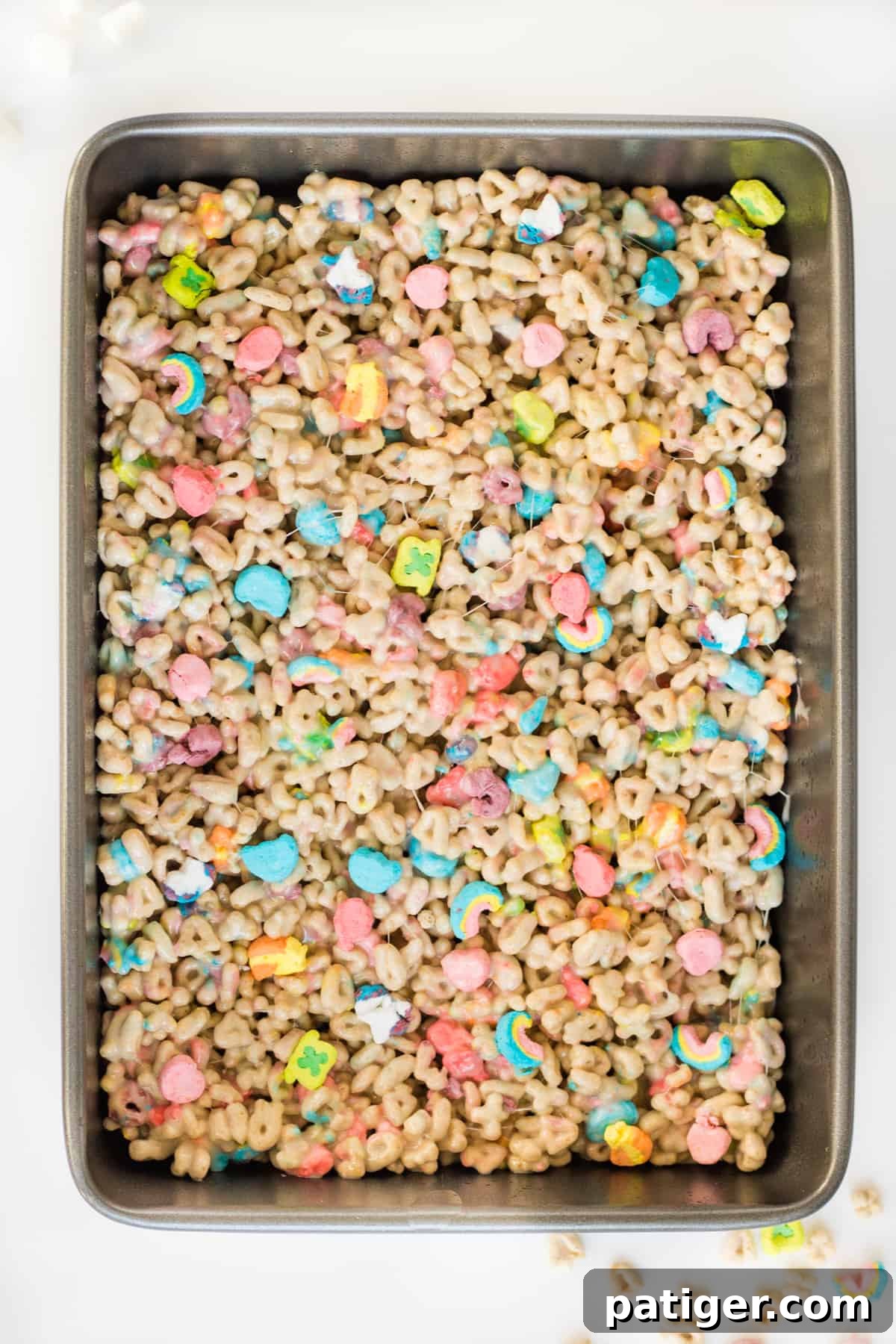 Magical Lucky Charms Treats 7 9 x 13 inch baking pan with Lucky Charms treats still uncut in it
