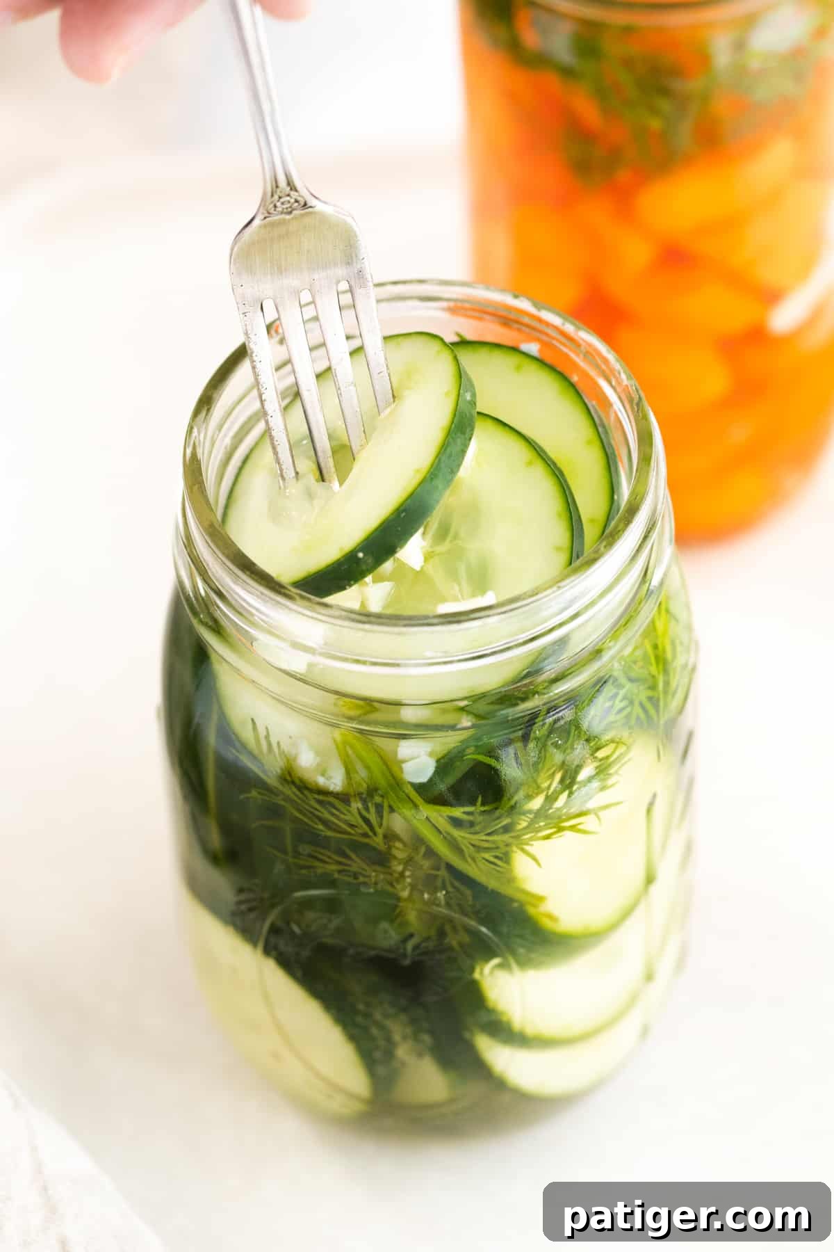 Effortless Fridge Pickles 3 Open wide-mouth mason jar showcasing vibrant quick pickles