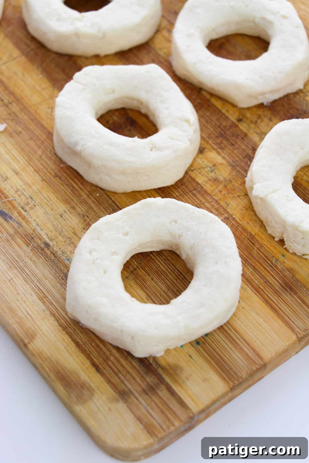 Choco-Biscuit Bliss Bites 4 Canned biscuit dough with hole cut out of middle to become a doughnut