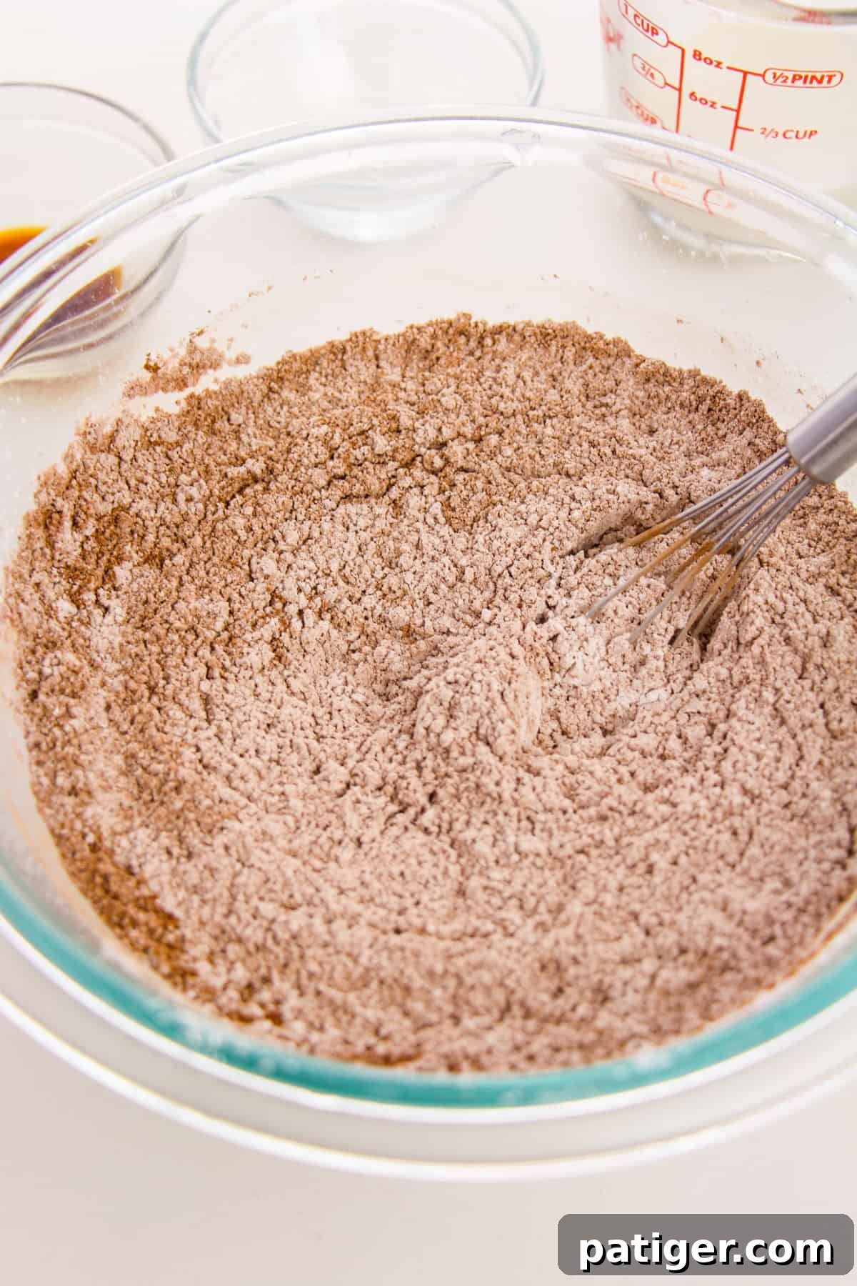 Choco-Biscuit Bliss Bites 7 Dry icing ingredients mixed together in glass bowl