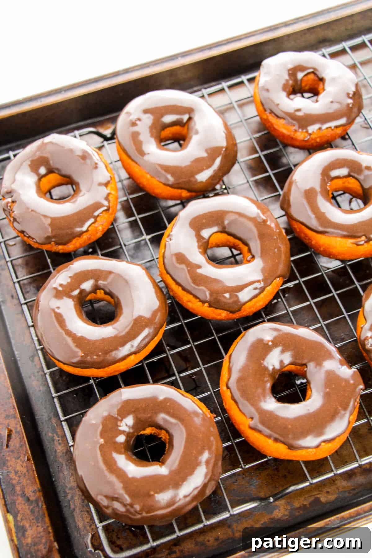 Choco-Biscuit Bliss Bites 9 Biscuit Doughnuts with Chocolate Icing on wire rack