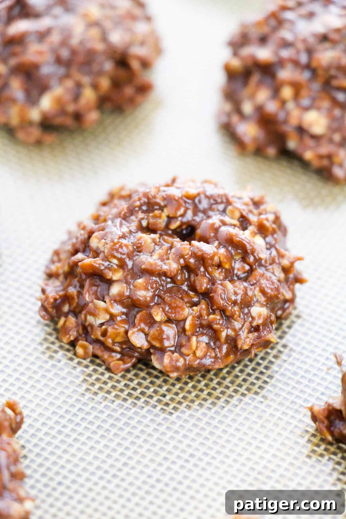 Nutella No Bake Cookies with oats cooling on silicone baking mat