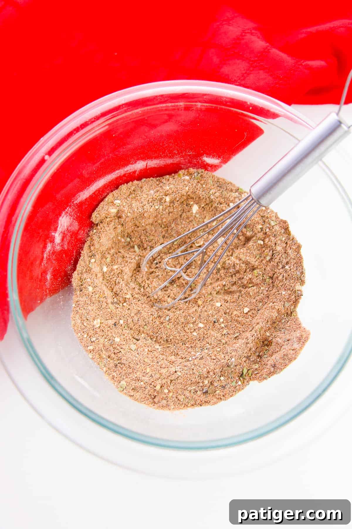 Craft Your Own Chili Spice Blend 5 Glass bowl with homemade seasoning for chili, freshly mixed and ready for storage or immediate use.