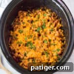 Small image of slow cooker chili mac with ground beef, beans, and cheese.