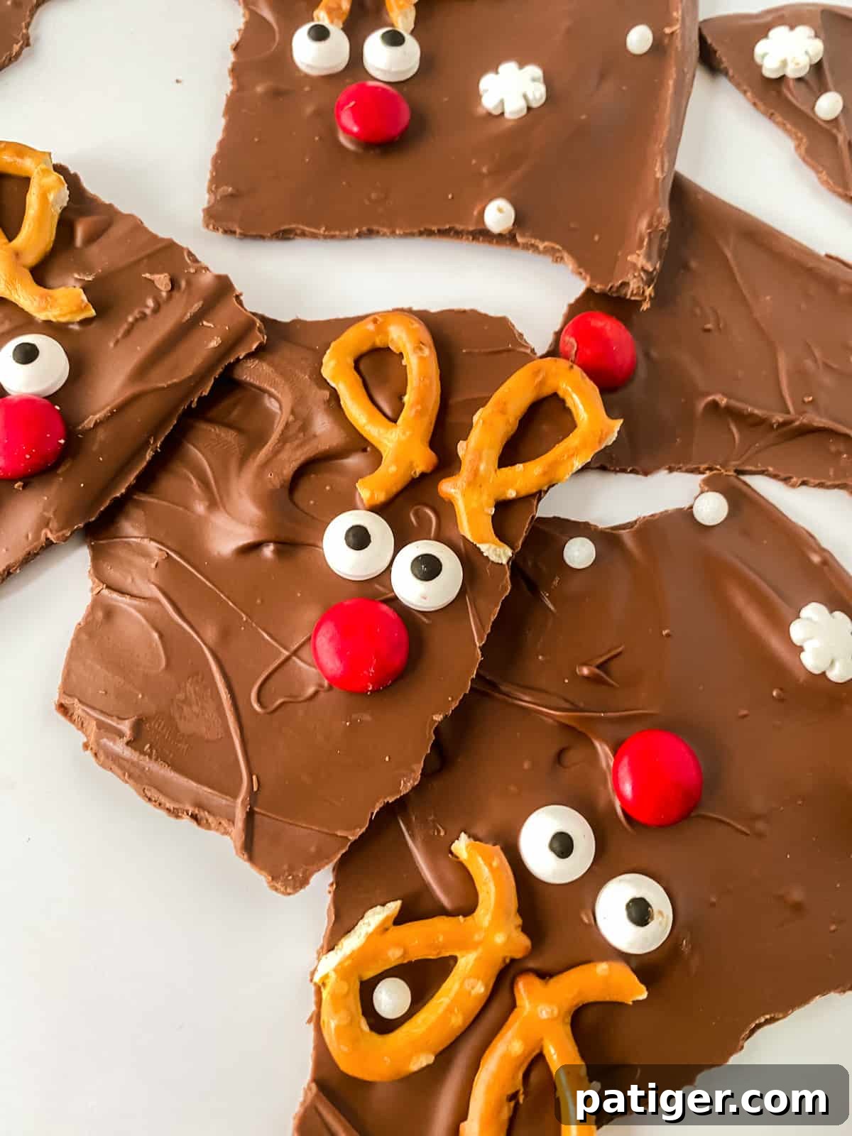 Reindeer bark with pretzel ears, candy eyes, and red M&M nose