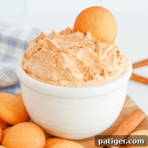 Pumpkin fluff dip served with nilla wafers for dipping, a delightful and easy fall dessert