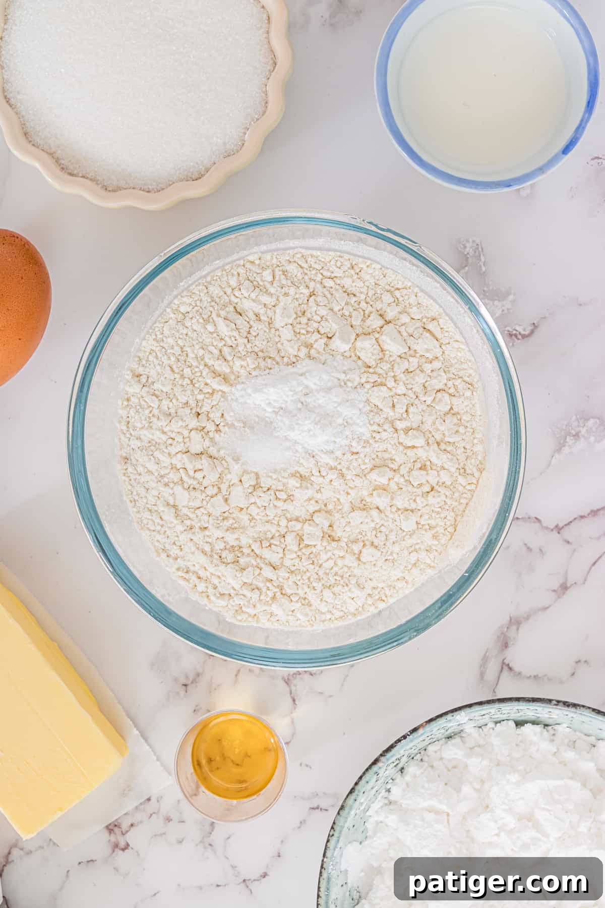 Timeless Christmas Sugar Cookie Delights 6 Dry cookie ingredients in mixing bowl