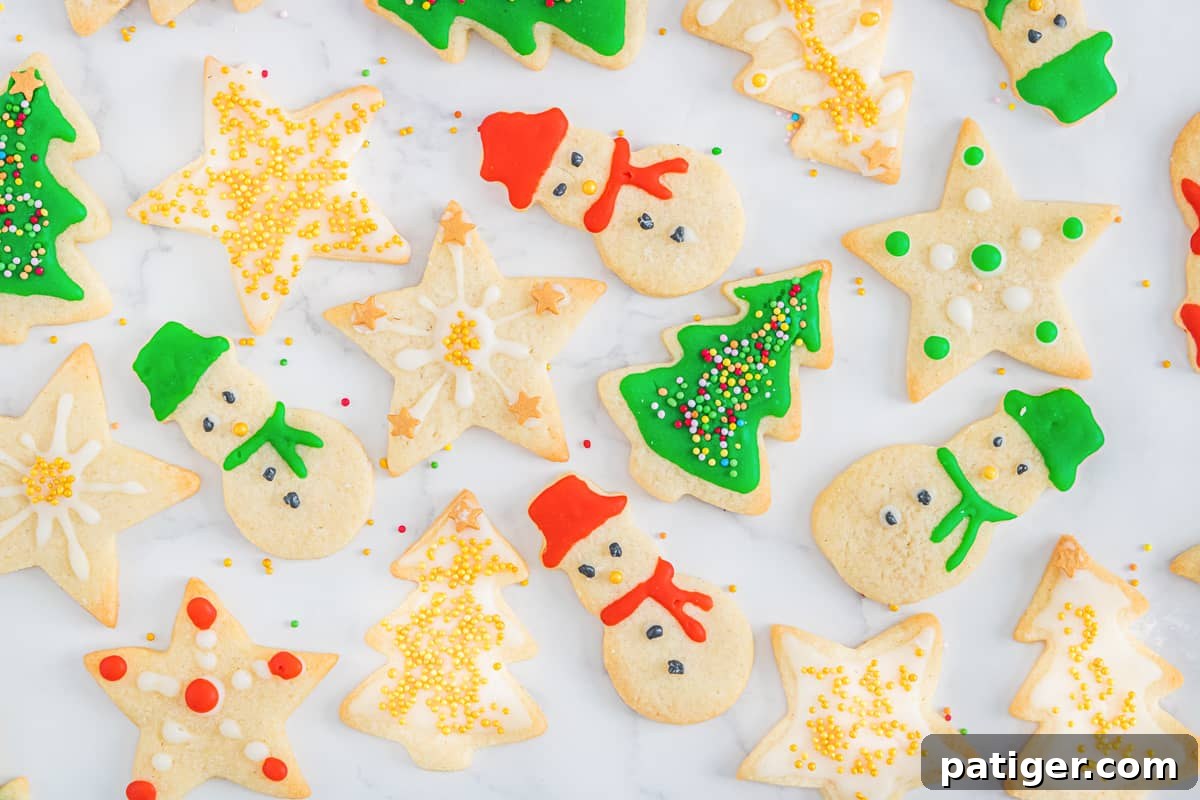 Timeless Christmas Sugar Cookie Delights 9 Decorated Christmas Cookies on parchment paper