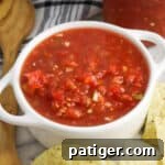 Rotel salsa dip served with tortilla chips, close up for recipe callout.