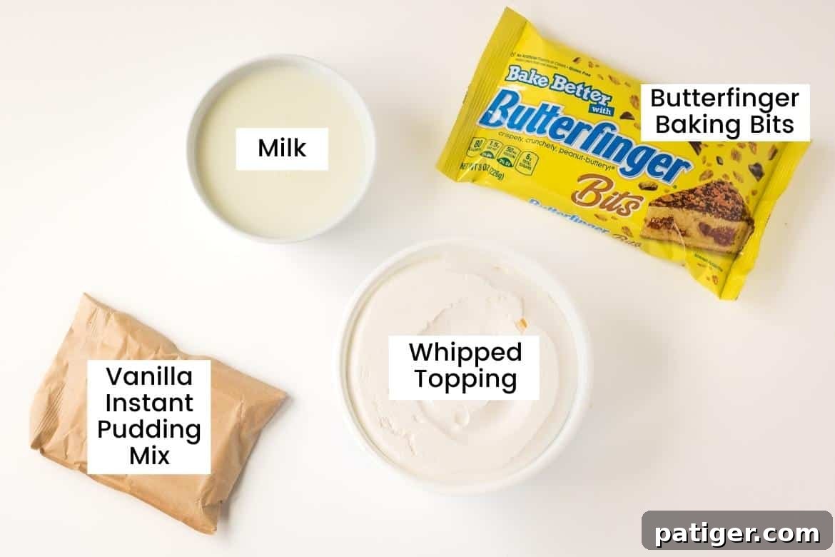 Ingredients for Butterfinger Fluff: a bowl of milk, a container of whipped topping, a bag of Butterfinger Baking Bits, and a package of instant vanilla pudding mix.