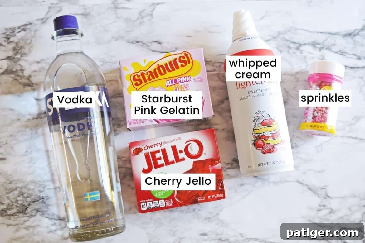 Romantic Jiggle Shots 4 Bottle of vodka, box of pink Starburt gelatin, box of cherry Jello, can of whipped cream, Valentine sprinkles