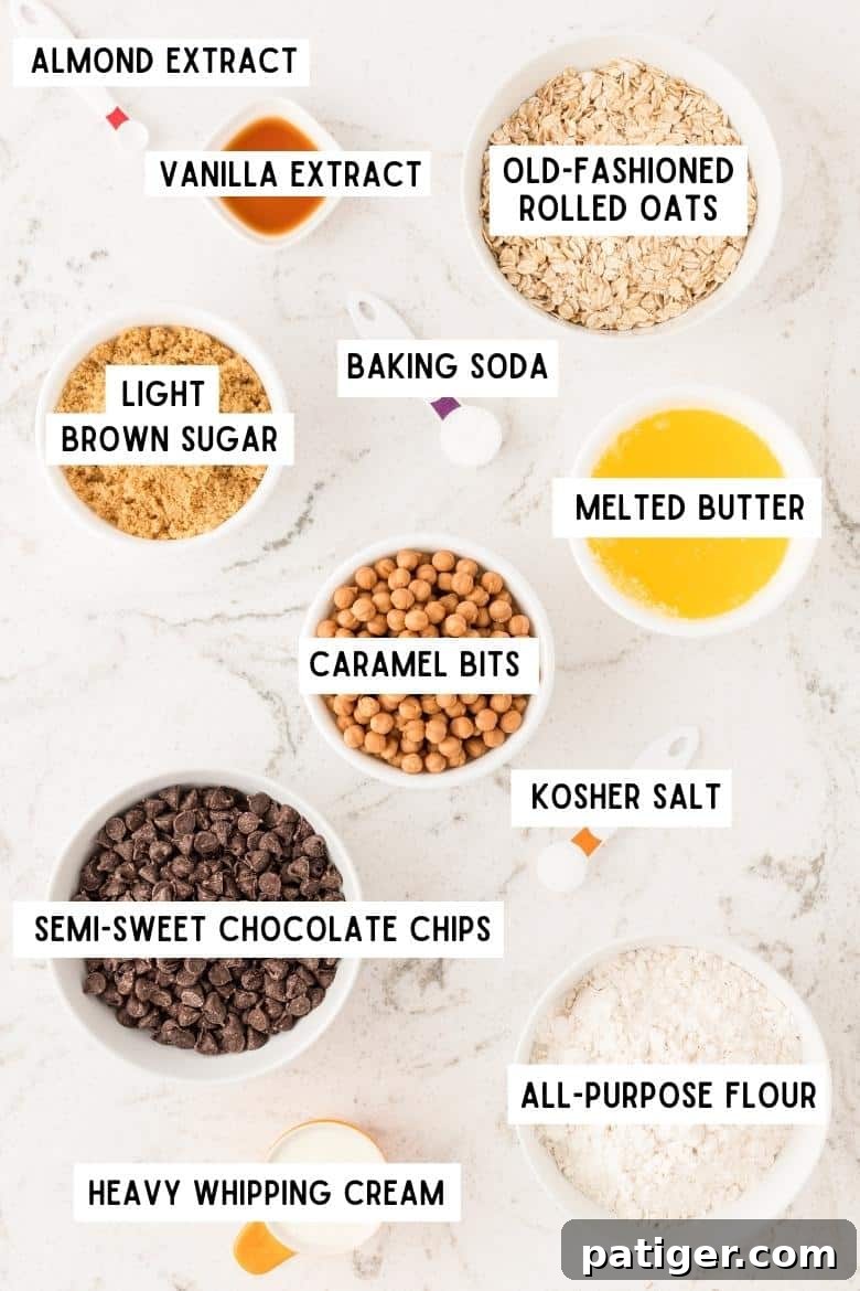 almond extract, vanilla extract, baking soda, kosher salt, semi-sweet chocolate chips, melted butter, brown sugar, caramel bits, heavy whipping cream, all-purpose flour, and old-fashioned rolled oats