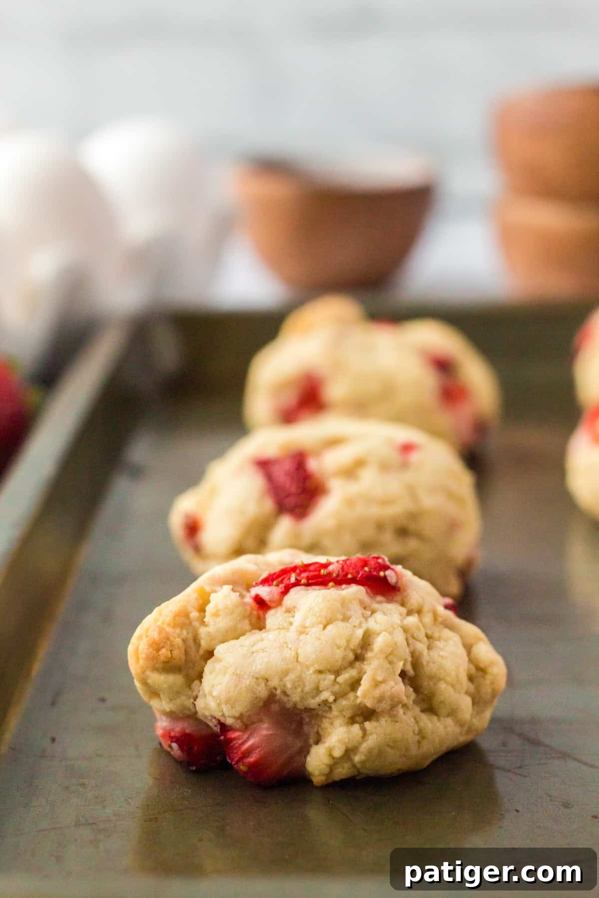 Strawberry Shortcake Cookie Bliss 4 thick strawberry shortcake cookies on baking sheet