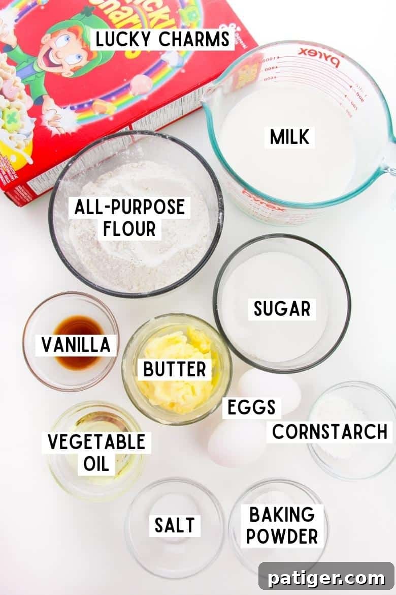 Box of Lucky Charms, 2 eggs, and bowls of the following: milk, purpose flour, white sugar, vanilla, butter, vegetable oil, cornstarch, baking powder, and salt.