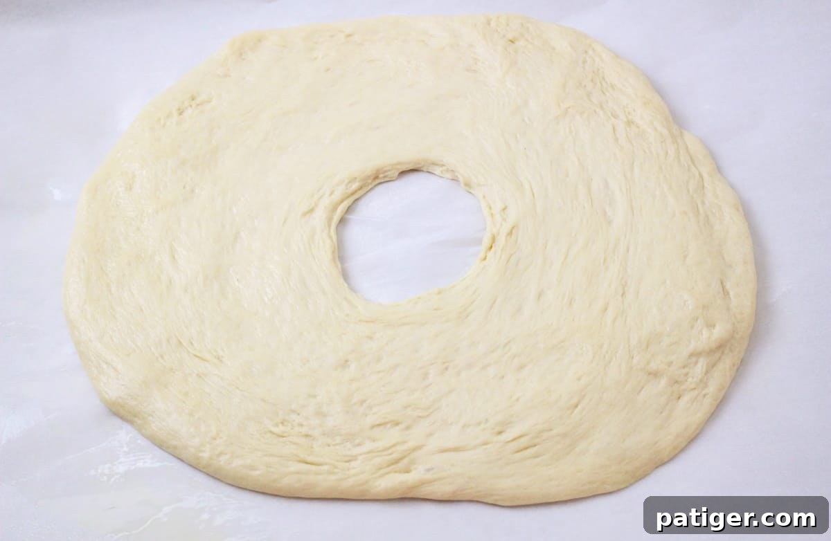 Dough rolled into ring with hole in center