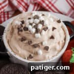 Hot chocolate dip with cool whip, hot cocoa mix, marshmallow bits, and mini chocolate chips.