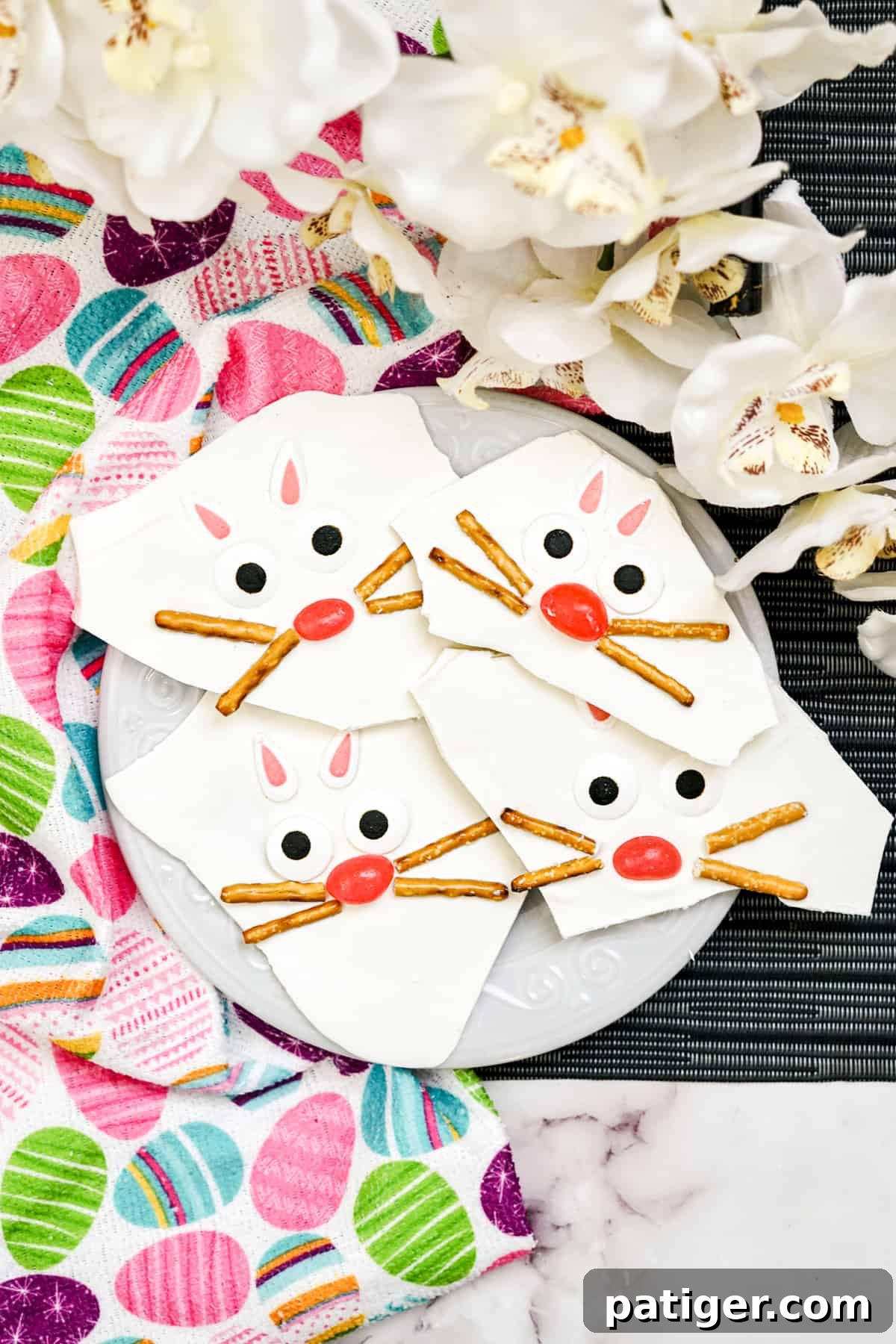 Easter Bunny Bark with pretzels, jelly beans, candy eyes, and candy ears, a delightful and easy no-bake Easter treat perfect for families.